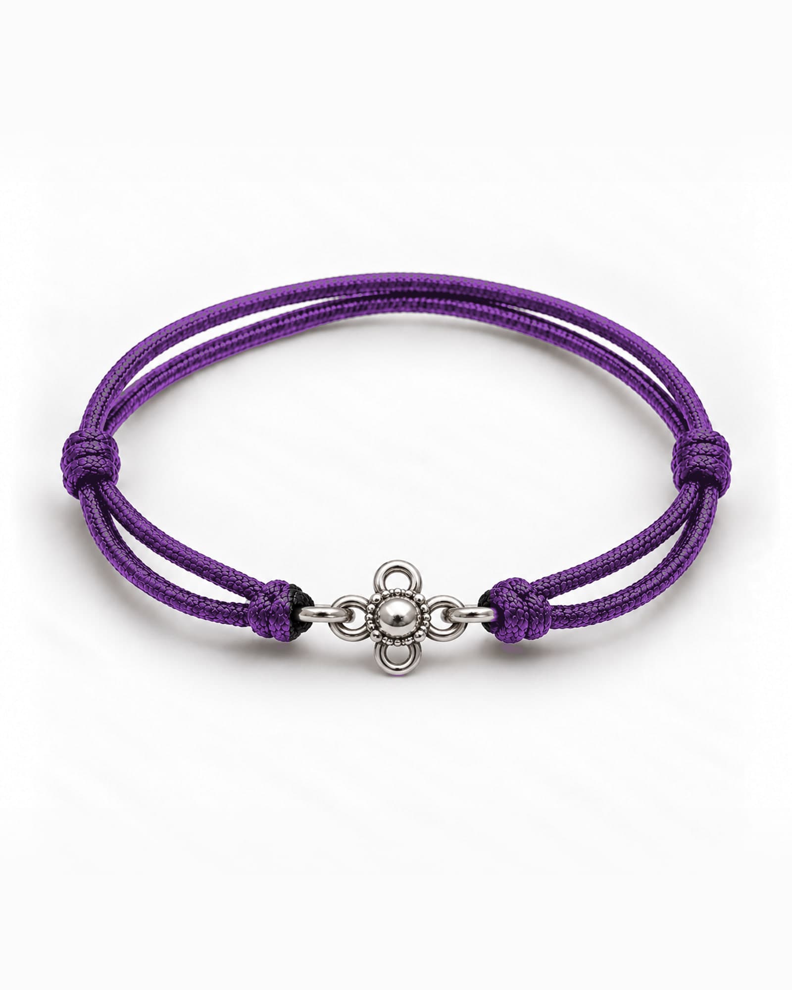 Lotus in sterling silver on Purple braided cord